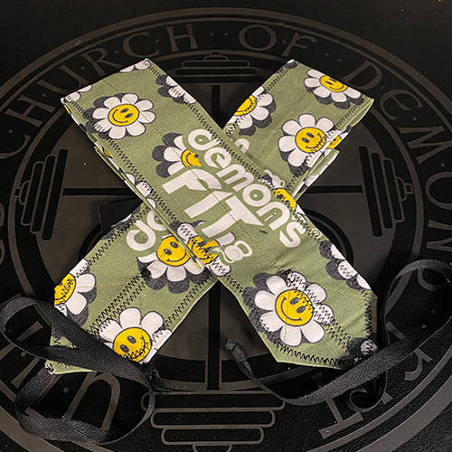 MUÑEQUERA TELA MARGARITAS/U/VERDE MILITAR