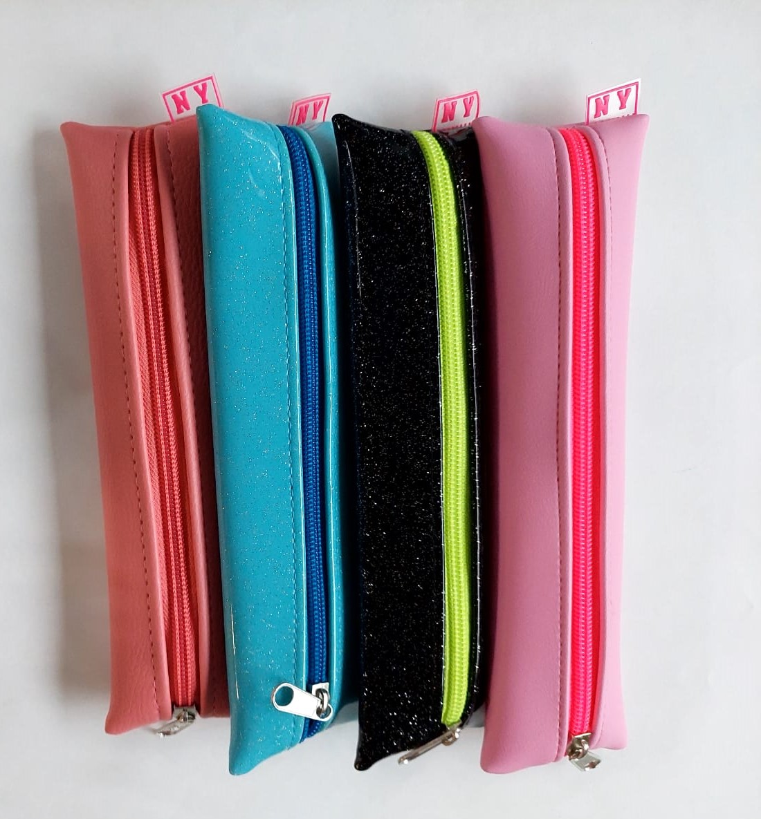 CARTUCHERA NY UNIVERSITARIA NEON