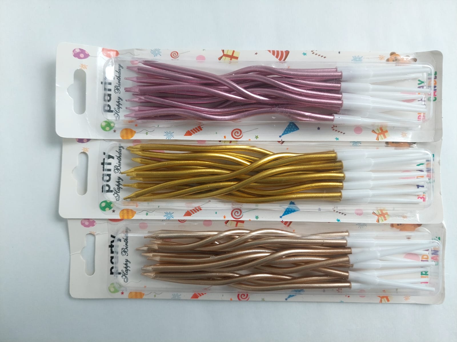 PAQUETE VELAS ESPIRAL PASTEL X 12