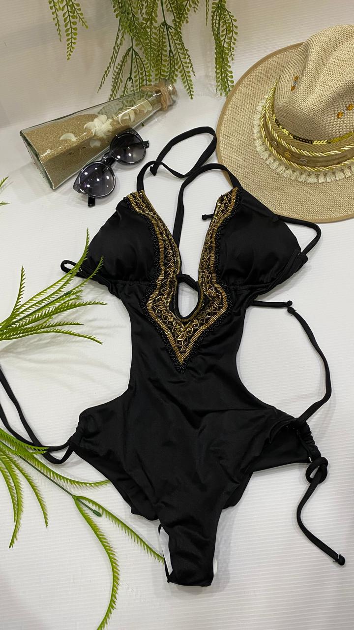 Enterizo negro dorado