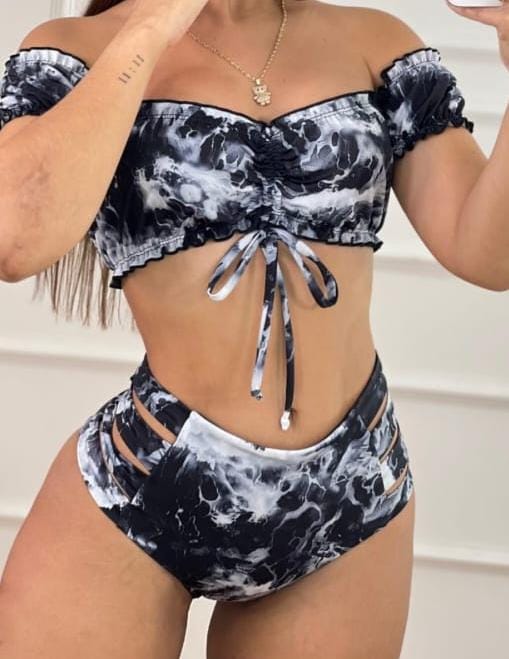 Bikini negro y blanco panty tiro alto aberturas y top boleros