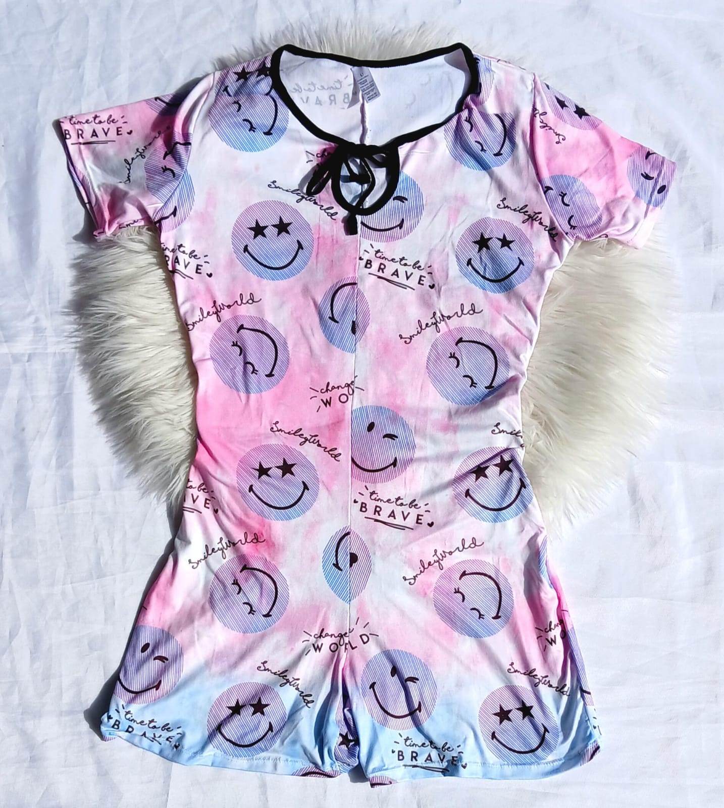 Pijama enterizo corto estampado caritas feliz