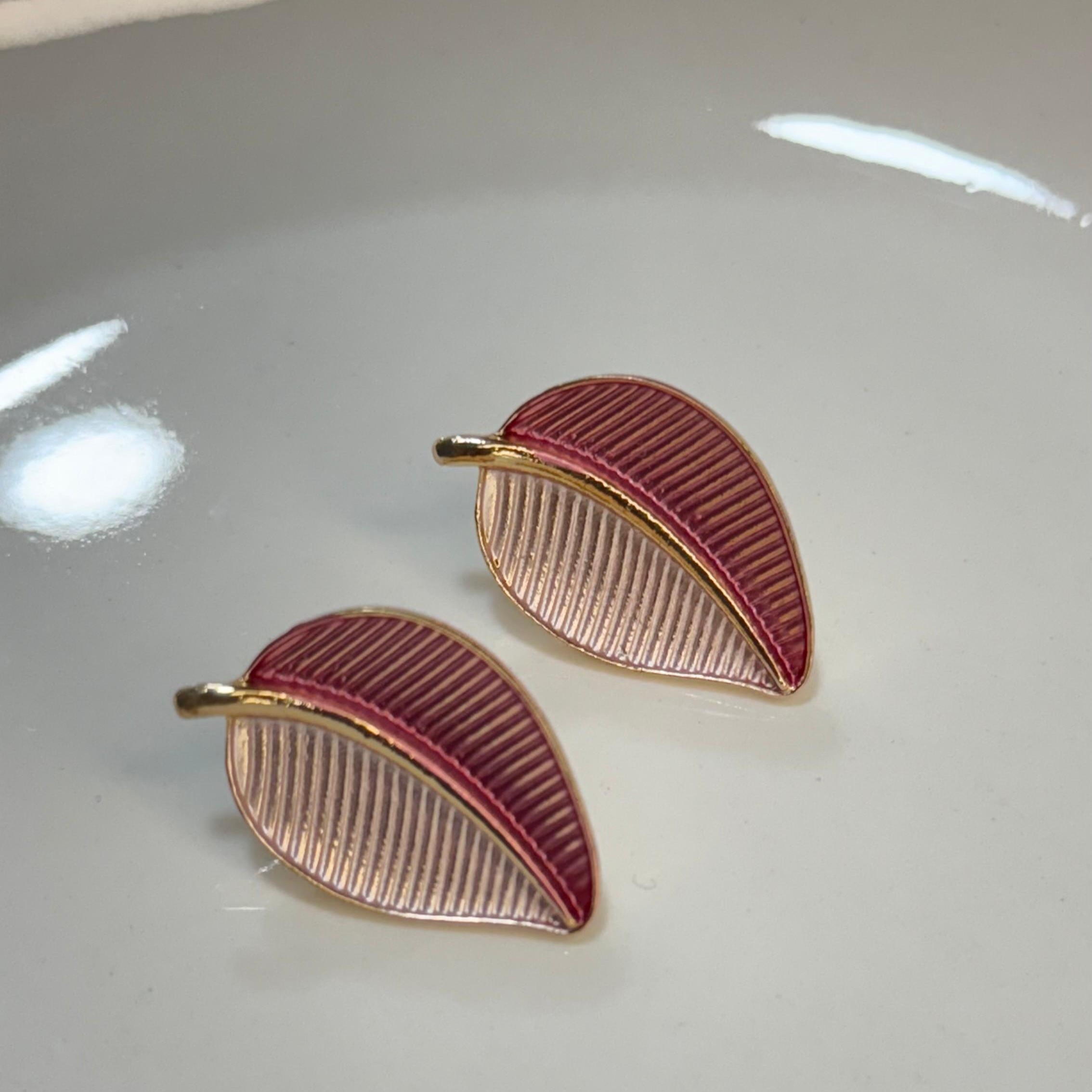 ARETES HOJAS ROSADAS DA122501