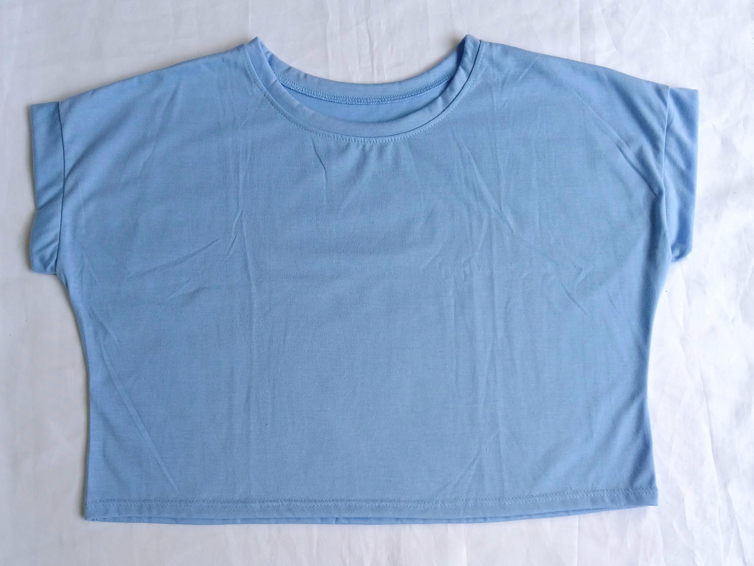 CAMISETA DEPORTIVA CORTA AZUL CIELO