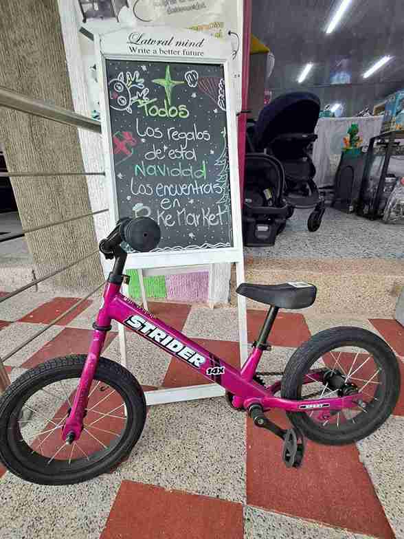 BICICLETA MORADA IMPULSO Y PEDAL